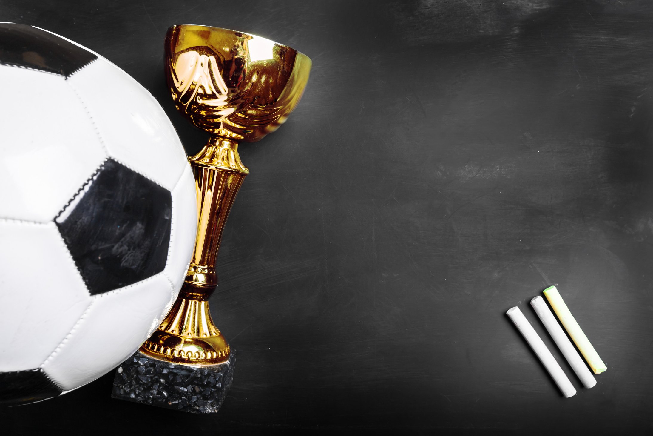 Trophy cup and soccer ball